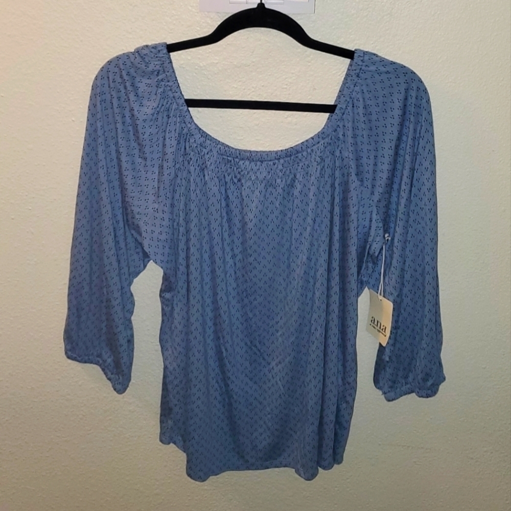 Ana Sz. Large flowy blue and black top
